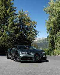 Bugatti Chiron Sport Finished In Both Gloss And Satin Exposed Green Carbon Fiber W Black Accents And The Number 1 Bugatti Chiron Bugatti Chiron Black Bugatti