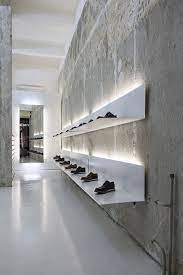 cement wall retail interior design retail store design shop interiors
