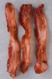 Unsurprisingly, plain bacon will cost you a little less than seasoned and calorie count goes up when the average weight does (thicker bacon will have more calories). Air Fryer Bacon For Frying Out Loud