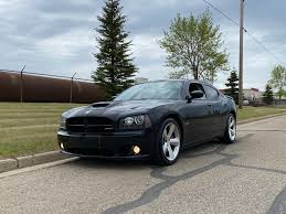 Image result for Brilliant Black 2009 Charger