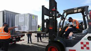 Moderna to supply 500 million vaccine doses to who's struggling covax initiative workers unload a shipment of moderna's coronavirus vaccine at a fedex hub in toronto on april 28. Covid 19 Vaccines Reach Over 100 Economies Under Covax Initiative Vatican News