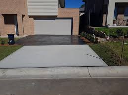 Concrete is a mixture of sand, crushed stone or gravel, and a paste consisting of water and portland cement. Concreting Services Sydney Hills District Concrete Driveways