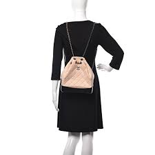 The gabrielle backpack as seen on chriselle lim. Chanel Aged Calfskin Quilted Large Gabrielle Backpack Beige Black 417550