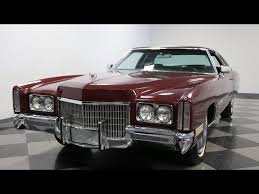 Image result for Empire Maroon 1969 Cadillac