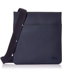 La pochette bandoulière lacoste est composée d'un compartiment principal, de deux poches intérieures et d'une poche frontale simple. Sacoches Lacoste Pour Homme Jusqu A 54 Sur Lyst Fr