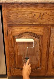 The Hottest New Way To Update Your Kitchen Cabinets Is Here Painting Kitchen Cabinets Diy Kitchen Cabinets Kitchen Cabinets Makeover