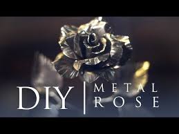 Cut out pattern on sheet metal and drill center hole. How To Make A Metal Rose Without Welding And Forging 9 Steps With Pictures Welded Metal Projects Metal Roses Metal Projects