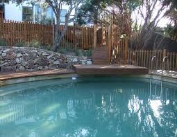 Landscape Designed And Constructed By Abben Art Garden Design Decking And Fence By Outdoor Woodworks Poo Landscaping Around Pool Dry Stone Wall Garden Design