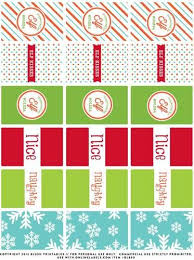 These printable crafts are perfect for busy turn this fun holiday decoration into a kids craft by setting up stations for candy, frosting fill each baggie with a surprise for the kids and have them help you hang them up and label them randomly. Free Christmas Elf Printables And Holiday Label Templates Onlinelabels Com Blog Free Printable Christmas Labels Templates Candy Labels Christmas Wrapper