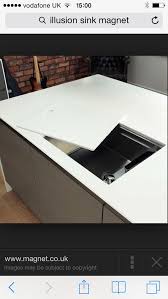 See more ideas about kitchen cabinets, kitchen remodel, upper kitchen cabinets. Illusion Sink Extra Work Top Hidden Sink Hidden Kitchen Kitchen Remodel Small White Modern Kitchen