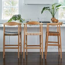 teak and woven leather bar stool