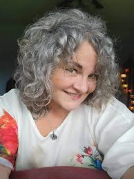 Should I stop coloring my hair and go grey?