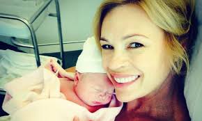She was worth the wait!' First look at Sonia Kruger and Craig McPherson's  miracle baby girl Maggie... as the 49-year-old new mum jokes she was named  after The Simpsons