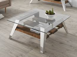 This coffee table is made of solid wood and has a contemporary design that can match a living room or any room with a modern style. Square Stainless Steel And Wood Coffee Tables Archiproducts