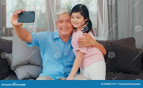 Asian Grandfather and Granddaughter Video Call at Home. Senior Chinese  Grandpa Happy with Young Girl Using Mobile Phone Video Call Stock Image -  Image of grandparent, house: 209861141