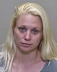 Ocala woman caught with drugs and stolen gun in her car