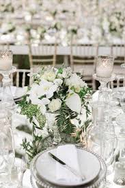 What to put on a white centerpiece at a wedding? Luxe Destination Wedding In Athens In Classic White Green Ruffled
