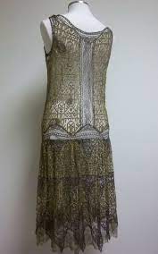 The waistline is dropped to at or slightly below the hips and because of this design. Reserved For Fifi 1920s Lace Flapper Drop Waist Dress In Gold And Black Dropwaist Dress Drop Waist Dress 1920s Dresses