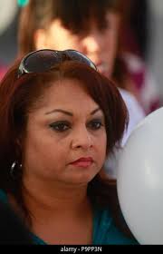 Familiares y fans de Jenny Rivera acudieron esta tarde a la cima de el  cerro de la campana en la ciudad de Hermosillo Sonora para rezar por su  muerte Stock Photo