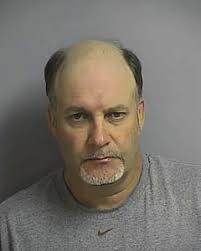 Suspect charged with attempted murder after pushing disabled man into  highway traffic