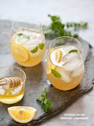 You must be of legal drinking age to enter this site. Whiskey Lemonade Made With Honey Simple Syrup