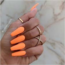 Pick a bright acrylic color and paint them solid or in a geometrical pattern. Matte Orange Coffin Nails Matte