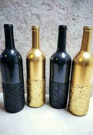 Gold Glitter Wine Bottle Set Of 2 Gold Centerpiece Gold Etsy Glitter Wine Bottles Wine Bottle Centerpieces Bottle Centerpieces