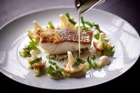 This pan fried sea bass recipe is a wonderful way to eat a mild, affordable fish, and it's packed with flavor from fresh oregano, thyme, and parsley. Roasted Sea Bass With Cauliflower Couscous Fried Oyster Sea Vegetables Cauliflower Couscous Fried Oysters Sea Vegetables