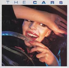 The Cars' debut album cover features a model
