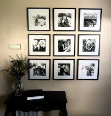 Black And White Wall Collage Pictures Black And White Framed Picture Arrangement In 2020 Picture Arrangements Frame Arrangement Farm House Living Room