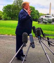 Image result for trump leaning forward