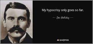 Doc Holiday is buried in GA not too far from Atlanta Georgia, his body was  transported back to his family and he does have a grave stone, however not  with guns and