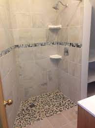 For example, choose larger squares of porcelain tiles with a bold graphic such as a freeform flower design. Floor Tile Trim On Shower Walls Google Search