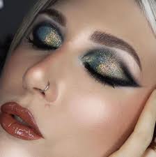 blondiemoustache creates this beautiful eye glam using our Epic Smoke Liner  in the shade 'Black Smoke' and our Thick It Stick It Brow Gel in the shade  'Taupe' to acheive this iconic