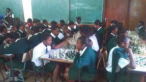 Her satirical monologues usually feature her crunching potato crisps, leaning back to a pillow and using a pair of tiny 1990s sunglasses as a prop. Alliance High Open Chess Tournament 2017 Kenya Chess Masala