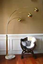 There are 62 antique and vintage arc floor lamps for sale at 1stdibs, while we also have 2 modern editions to choose from as well. Vintage Brass Arc Floor Lamp Mid Century Orb Lamp Metallic Gold Modern Ball Pendant Marble Base Three 3 Globe Tall Furniture Brass Lighting Arc Floor Lamps Modern Arc Floor Lamp Floor Lamp