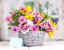 Your flowers bouquet stock images are ready. Beautiful Bouquet Of Bright Flowers In Basket On Wooden Table Stock Photo Picture And Royalty Free Image Image 15747154