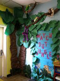 * explore the jungle from the safety of your classroom with this bulletin board that features two large treehouses that can be displayed separately or joined together with a rope bridge and zip line. Pin By Barbara Atherton On Jungle Theme Classroom Jungle Safari Theme Classroom Safari Theme Classroom Jungle Theme Classroom
