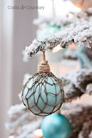 Just attach twine or ribbon to your beach shells. 7 Diy Coastal Christmas Ornaments To Make Right Now Shelterness