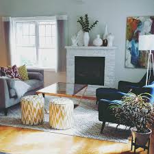 The best part is that this color seems to work with anything i throw at it—a teal blue accent color in the form of a sofa table? Contemporary Yellow Accent White Living Room