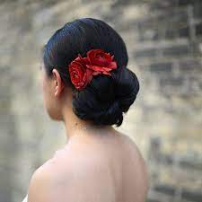 Updo Wedding Hairstyles With Special Details Modwedding Mexican Hairstyles Flowers In Hair Spanish Hairstyles
