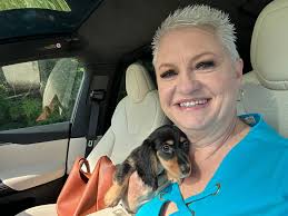 Introduce your short haired dachshund named Micker