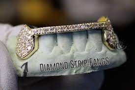 To our variety of gold grillz, fangs, 10k gold, 14k gold, 18k gold, 24k gold, white gold, yellow gold, rose gold, silver and platinum grillz. Custom Gold Grillz Gold Teeth Online Krunk Grillz