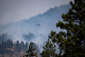 Smoke from wildfires turned the sky a deep red in vernon, b.c. The Latest 174 Wildfires Burning In B C Rossland News