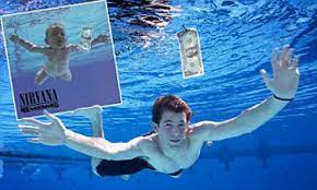 A photo of him as an infant — submerged in water and seemingly chasing a dollar bill dangling from a fish hook — became the cover of nirvana's 1991 release nevermind, considered one of. Baby On The Cover Of Nirvana S Nevermind Album Turns 20 Daily Mail Online