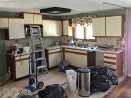 If you're reusing the hinges or pulls, store wearing rubber gloves, thoroughly clean the cabinet surfaces you're going to paint with a trisodium phosphate solution (follow the instructions on the box). Cabinet Refinishing Johnston Ri K Alger Woodworking