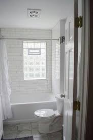 We Remodeled White Subway Tile Gray Grout Glass Block Window Simple Bathroom Remodel Window In Shower Bathrooms Remodel