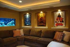 Nice Up Lighting In The Ceiling Accent Lights For The Movie Posters And A Sweet Salt Water Tank Home Theater Room Design Small Room Design Media Room Design