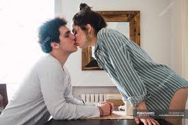 Check spelling or type a new query. Young Man And Woman Kissing At Table With Cups Room Weekend Stock Photo 204201132