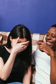 Premium Photo | Black man white woman couple laugh funny joke joy silly  together interracial relationship leisure concept